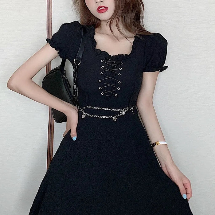 VenusFox Women's Goth Dress Summer Harajuku Punk Black Mini Dress Gothic Dark Streetwear Bandage Chain Cool Girl Sexy Y2K Outfits